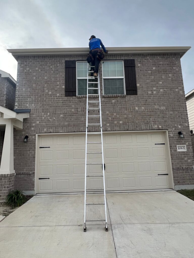 gutter Installation with worker