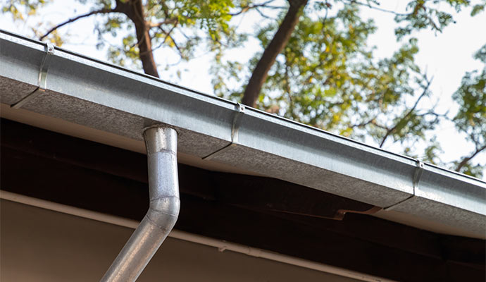 metal-galvanized-rain-gutter-on-roof