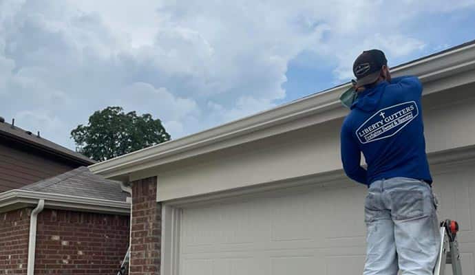 liberty gutters professional on the job